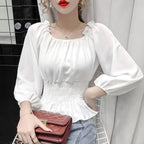 Virginia - Elegant off-shoulder blouse with ruffles