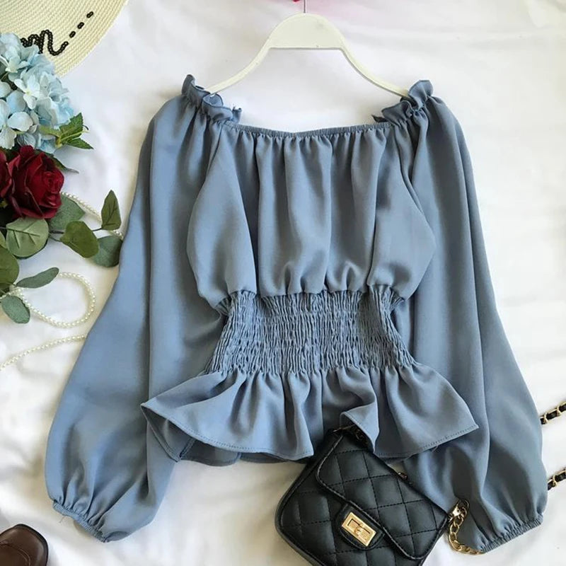 Virginia - Elegant off-shoulder blouse with ruffles